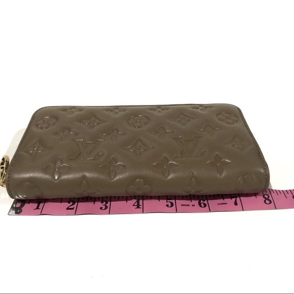 Authentic Louis Vuitton Coussin Monogram Embossed Lambskin Leather Zippy Wallet - Picture 9 of 16